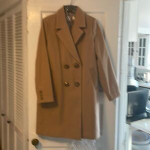 Cabi winter coat in camel. New never worn. Nice faux leather detail.